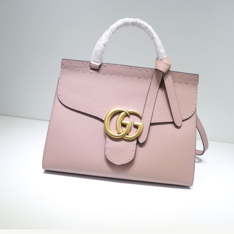 G*u*i top handle bags